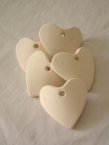 Tegole cuore in cotto - tegole,